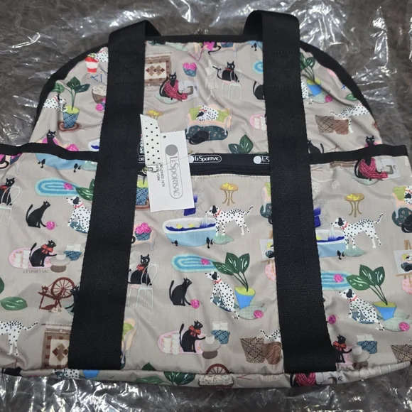 Lesportsac | Bags | Lesportsac Multicolor Cat And Dog Print 